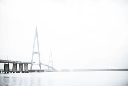 grayscale photography of suspension bridge thumbnail