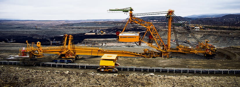 orange crane at construction field thumbnail