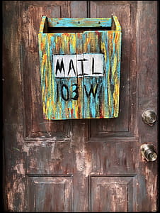 Multi-coloured Wooden Mailbox Mounted On Door thumbnail