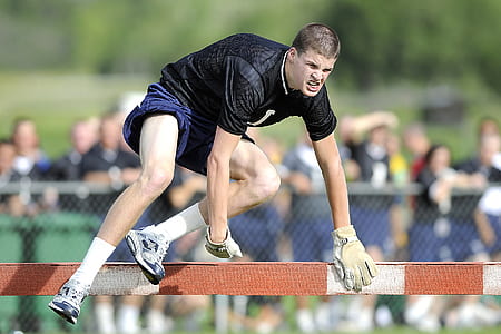 man jumping over rail thumbnail