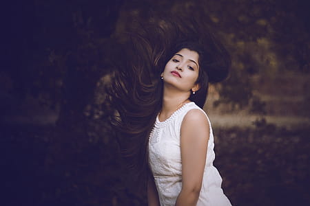 Selective Focus Photography of Woman in White Crew-neck Sleeveless Dress thumbnail