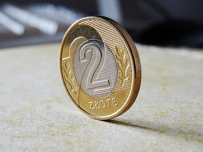 round silver-and-gold-colored coin thumbnail