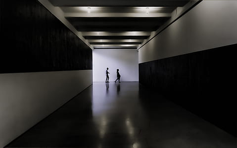 two person standing near wall thumbnail
