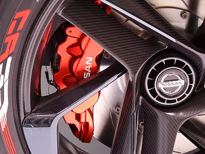 black Nissan carbon fiber vehicle rim thumbnail