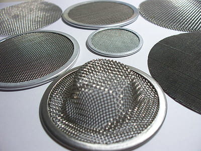 round gray steel screens on white surface thumbnail