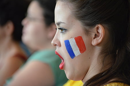 selective photo of woman open mouth with face paint thumbnail
