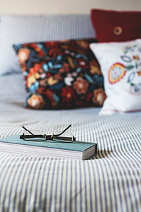 eyeglasses on book thumbnail