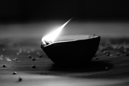 greyscale photography of candle thumbnail