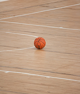 basketball on brown parquet floor thumbnail