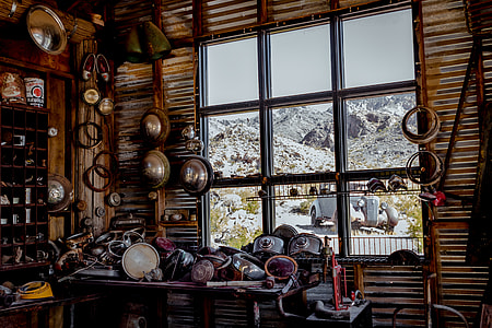 brown wooden framed window near table with items thumbnail