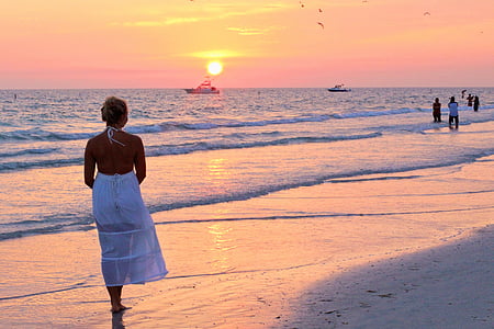 woman standing beside seashore thumbnail