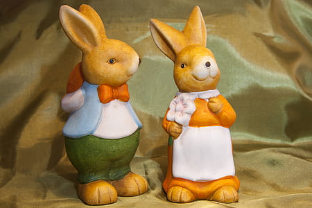 boy and white rabbit figurines thumbnail