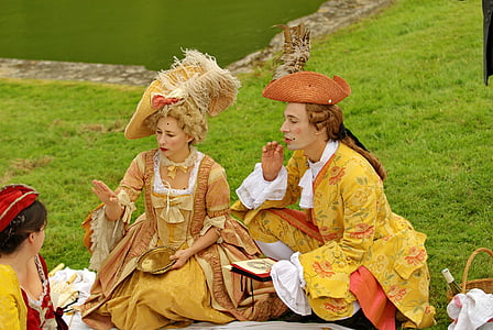 man and woman wearing yellow coats thumbnail
