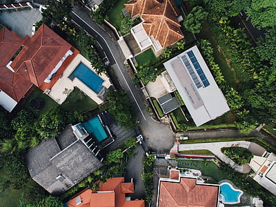 birds eye photography of houses and trees thumbnail