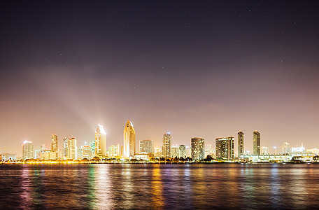 high-rise building near body of water thumbnail
