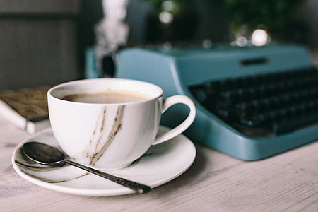 Working with old typewriter in the rainy day thumbnail