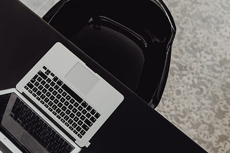 Stylish workspace with MacBook computer on home or studio thumbnail