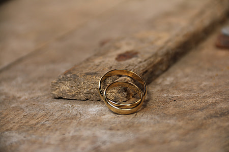 two gold-colored rings thumbnail