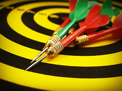 assorted-color darts low light photo thumbnail