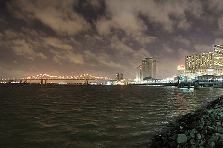city buildings near body of water thumbnail