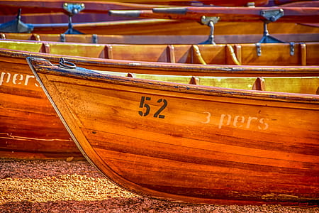 brown wooden canoes thumbnail