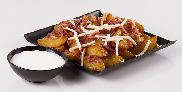 baked food with cheese and white dip thumbnail
