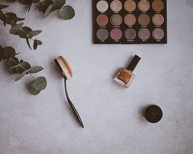 makeup brush near eyeshadow palette thumbnail