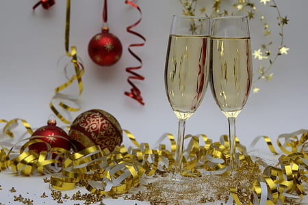 two clear champagne flutes thumbnail