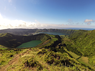 aerial view of green mountain ranges and field thumbnail