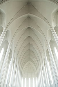 low-angle photography of triangular building interior thumbnail