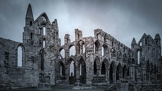 gray concrete structure under gray clouds thumbnail