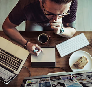 man drawing on graphic tablet thumbnail