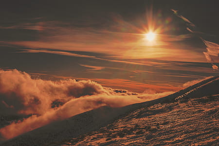 ground covered with clouds at sunset thumbnail