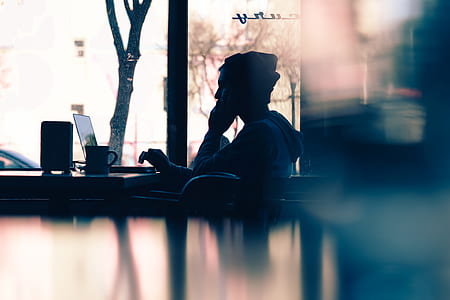 man using laptop on chair thumbnail