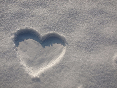 heart shape on snow field thumbnail