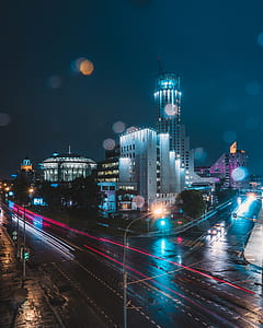 timelapse photography of buildings photo taken during nighttime thumbnail