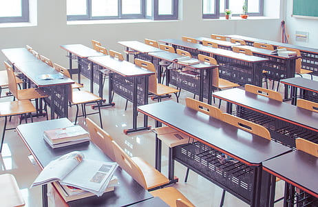 black study desk with books on top thumbnail
