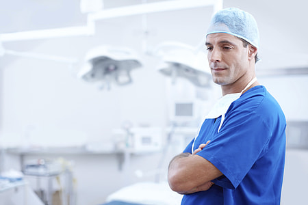 Dentist in surgery clinic thumbnail