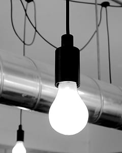 two lit light bulbs thumbnail
