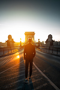 man in red and black plaid flannel shirt and black pants thumbnail