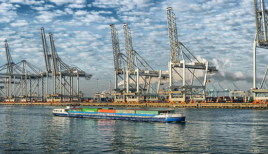 blue and gray ship near shore at daytime thumbnail
