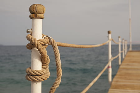 shallow focus photography of yacht dock thumbnail