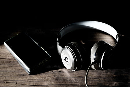 grayscale photography of Beats By Dr. Dre corded headphones thumbnail