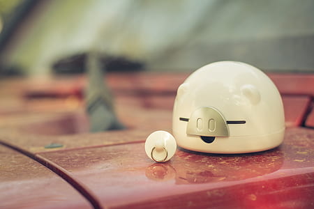 Shallow Focus Photography of White Ceramic Piggy Bank thumbnail