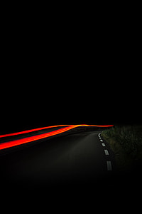 time lapse photography of asphalt road during nighttime thumbnail