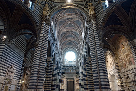 gray concrete cathedral interior near hallway thumbnail