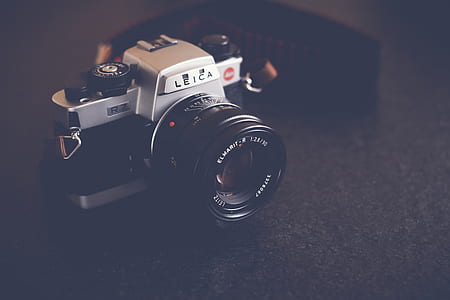 closeup photo of gray and black Leica MILC camera thumbnail