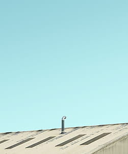 roof vent under blue sky at daytime thumbnail