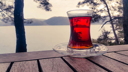 Turkish clear glass teacup on selective focus photograph thumbnail
