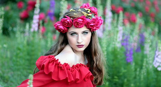 woman wearing red off-shoulder dress and rose headband thumbnail